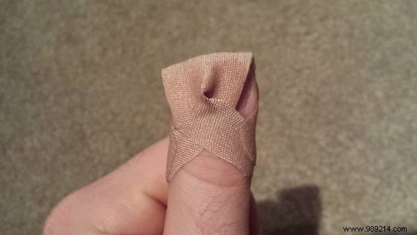How to Make a Bandage Stick on Your Fingertip Longer. 