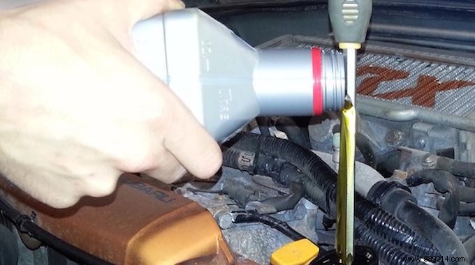 No Funnel To Add Oil To Your Engine? Use a screwdriver! 