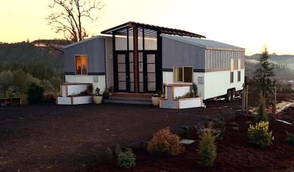 This Beautiful House Is Actually Made Up Of Two Tiny Houses Connected To Each Other By A Veranda. 