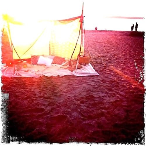 Poles + Old Sheet =A Gorgeous Bohemian Beach Tent! 
