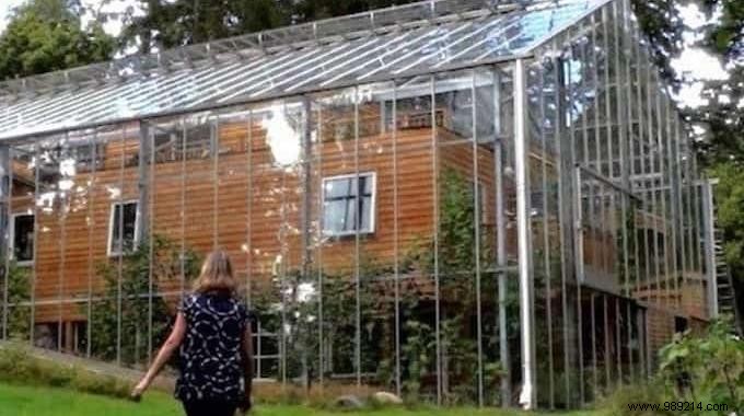 This Couple Built A Greenhouse Around Their House To Grow Vegetables And Keep Warm. 