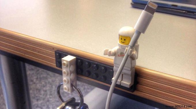 LEGO Minifigures Are Perfect For Holding The iPhone Cable. 