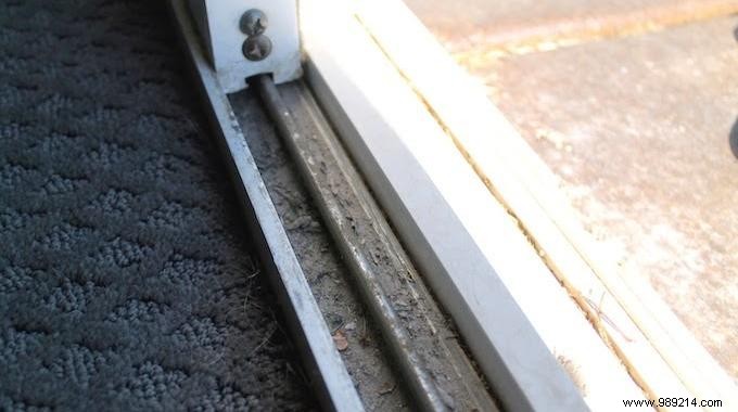 How to easily clean the track of a patio door. 