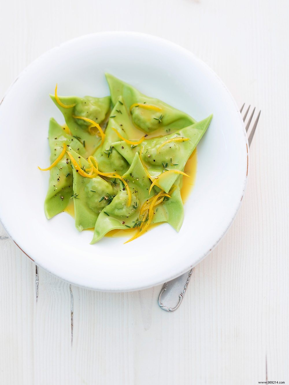 Recipe for green ravioli with duck filling and orange sauce 