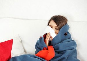 Why Going to Work Sick Hurts Productivity More Than Helps