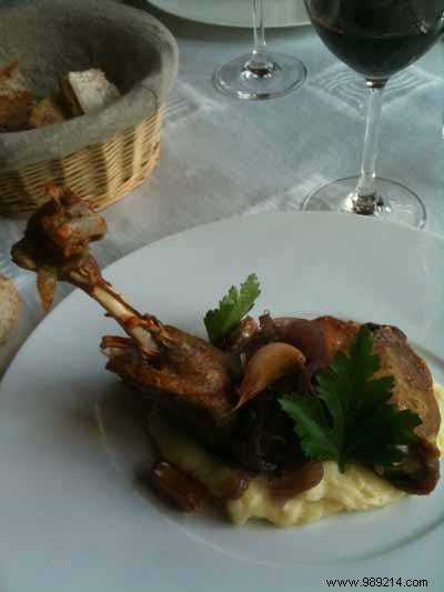 Duck confit with garlic confit from Lomagne, fingerling potatoes purée with salted butter. 