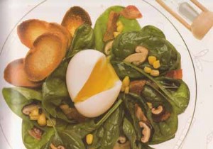 Spinach leaves with soft-boiled egg and oak lentins, garlic croutons 