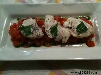 Sashimi of fresh cod with anchovy butter on crushed tomatoes my way 