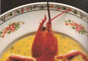 Grilled lobster with salted butter, bouquet of fine herbs and caviar sauce 