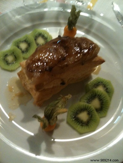 Puff pastry of light caramelized pears, vanilla mousseline cream, gentian ribbon and love in a cage 