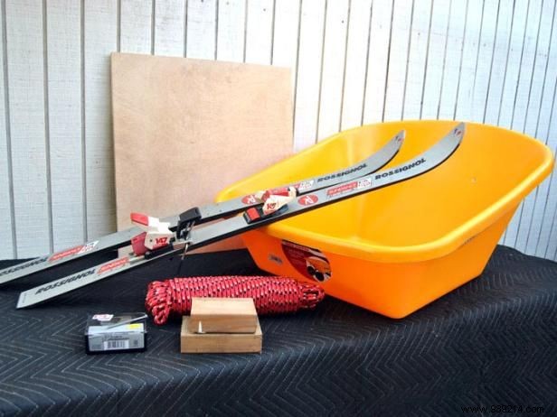 How to build a sled from a pair of old skis and a wheelbarrow