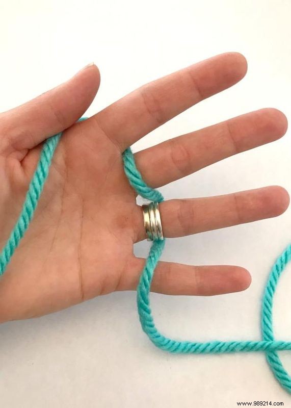 No knitting needles are required to make this hand knit necklace