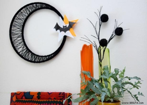 Spooky (and easy) Knitted Halloween Moon Wreath